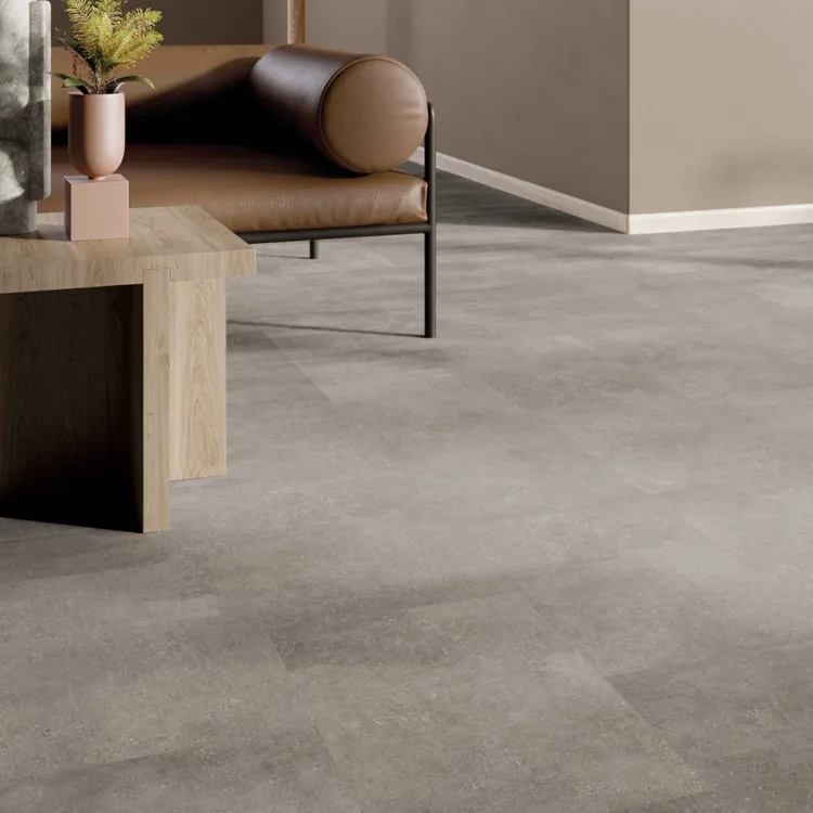 Detail moderne kamer met industriële uitstraling en Dersimo betonlook vloer